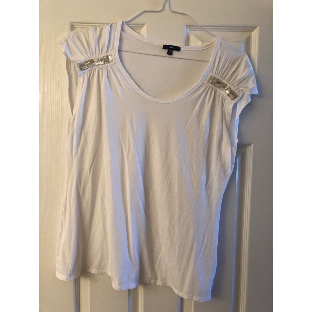 Gap top with embellished shoulders.